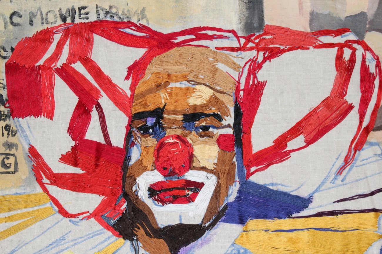 Image of Chanel Thomas’s painting featuring a clown at center. 