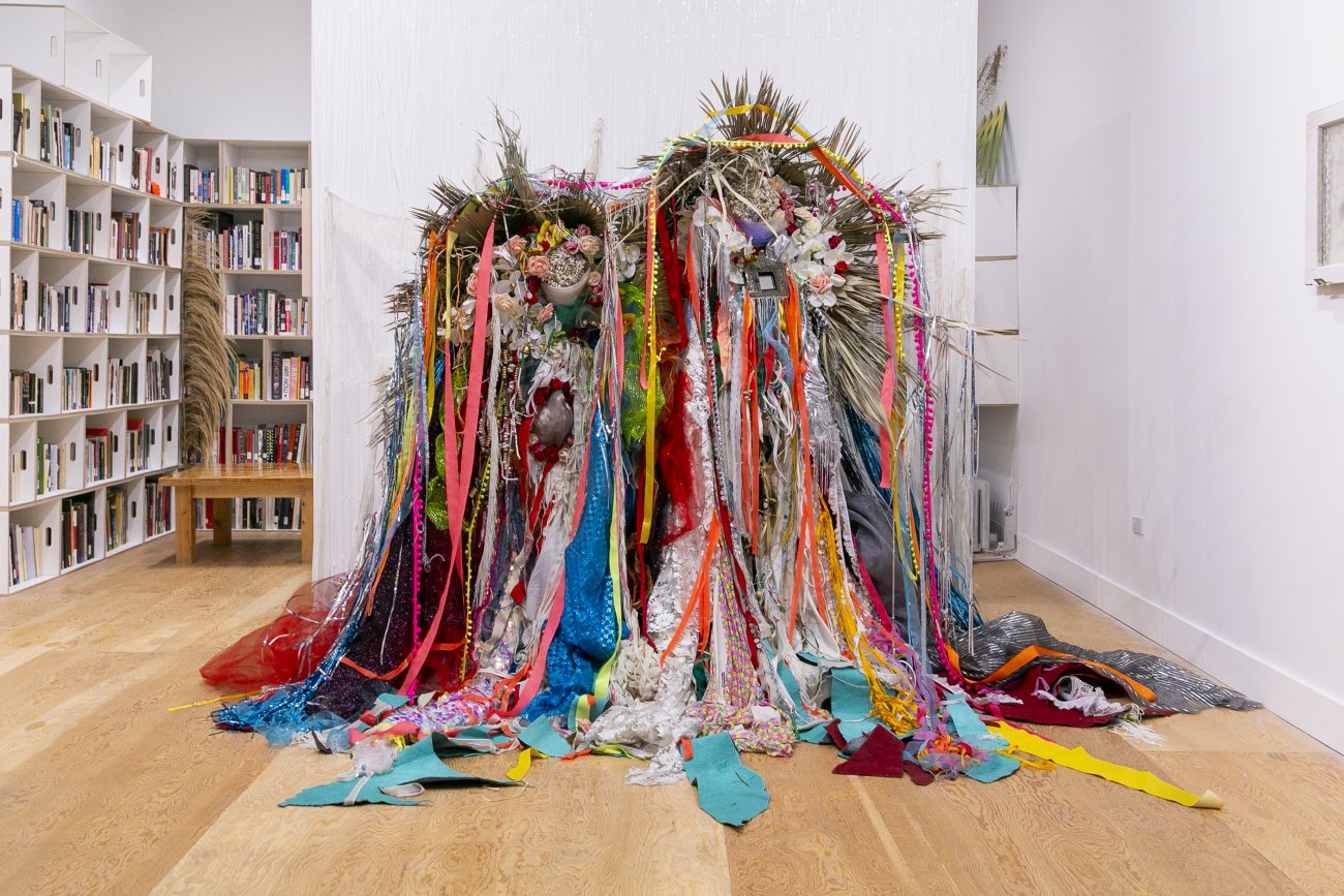 Site-specific mixed media installation with fabric and plant life