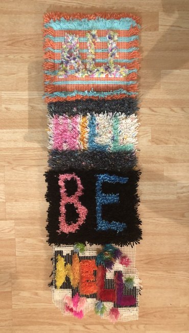 Rug with text "all will be well"