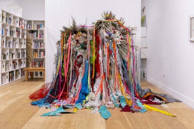 Site-specific mixed media installation with fabric and plant life